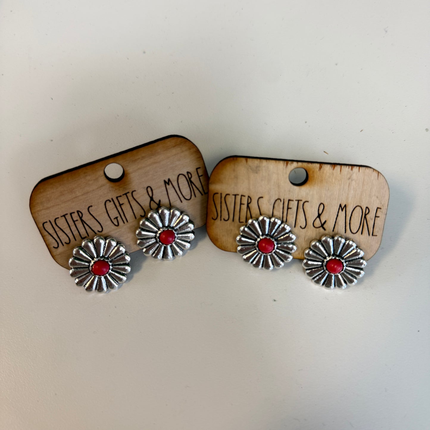 Red Stone on Silver Flower